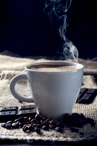 istock Delicious cup of cappuccino with cinnamon and chocolate 185626856