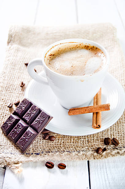 istock Delicious cup of cappuccino with cinnamon and chocolate 185626858