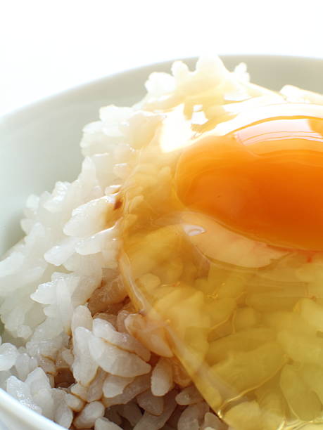 istock raw egg and soy sauce on steamed rice 185627378