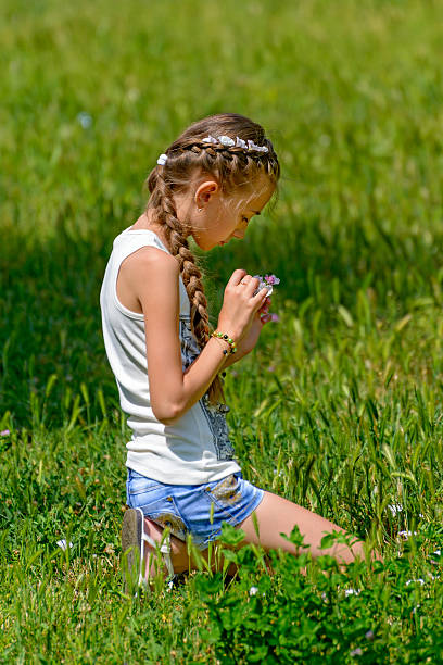 istock Girl on the meadow 185629503