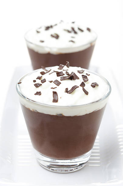 istock chocolate mousse with whipped cream on white background 185631493