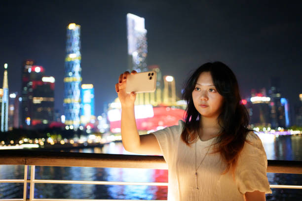 istock Woman taking selfie with smartphone 1856354972