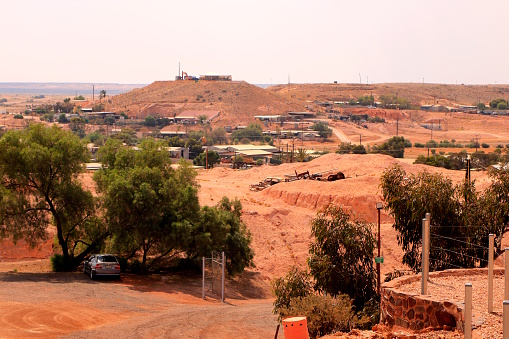 The desert landscape surrounding the opal mining town of Coober Pedy in the arid climate of outback Australia