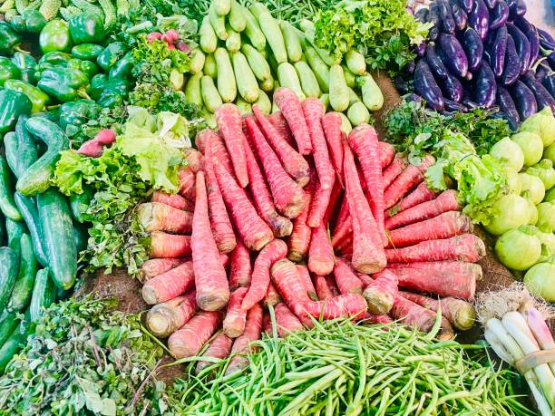 Vegetables tomato carrots and other winter season vegetables in vegetable market