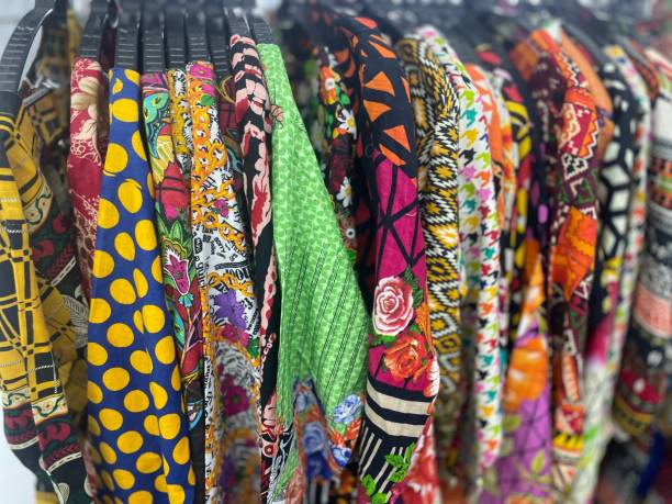 istock Clothes colourful clothes hanging in wardrobe 1856383891