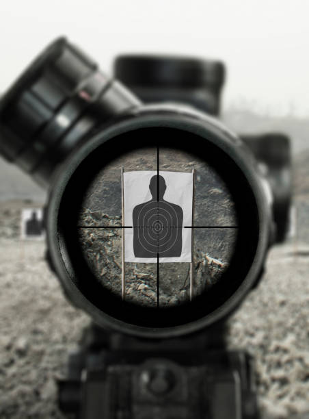 Focused soldier aiming a rifle in a dramatic scene, showing determination and tension in combat. An action-packed depiction of military readiness ideal for depicting courage, struggle, and tactical scenarios.