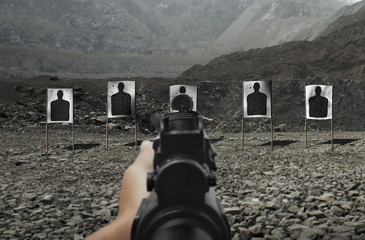 Assault Rifle Aim Pov Of Hand Aiming And Shooting Assault Rifle At Shooting Range Stock ...