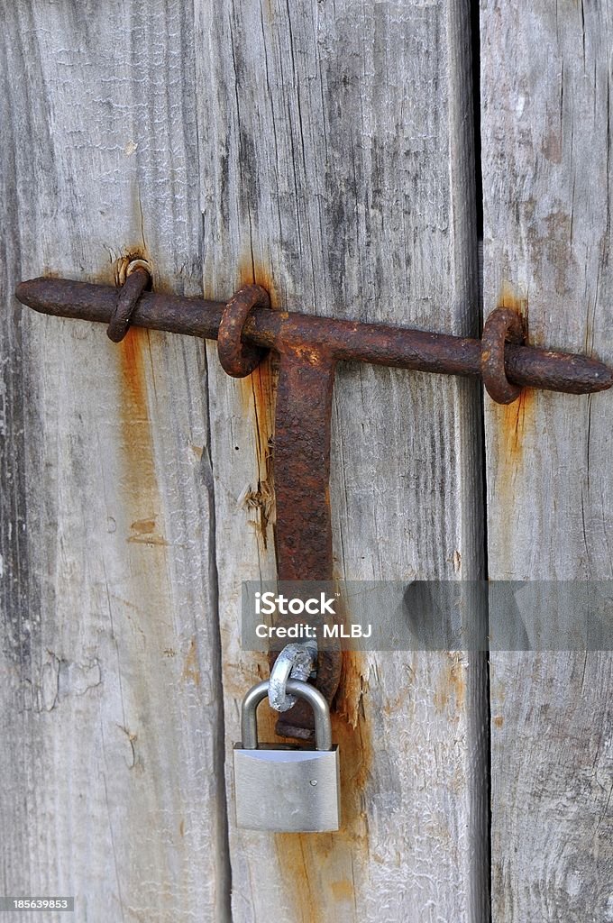 Rusty bolt Detail of an old door and a lock latch and rusty again Bolt - Fastener Stock Photo