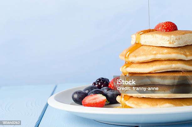 Stacked Pancakes And Fruit With Maple Syrup Stock Photo - Download Image Now - Pancake, Stack, Maple Syrup