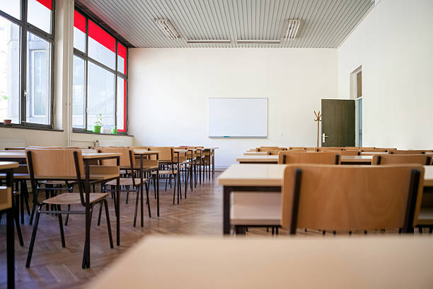 Empty classroom interior of empty classroom or lecture room empty desk in classroom stock pictures, royalty-free photos & images