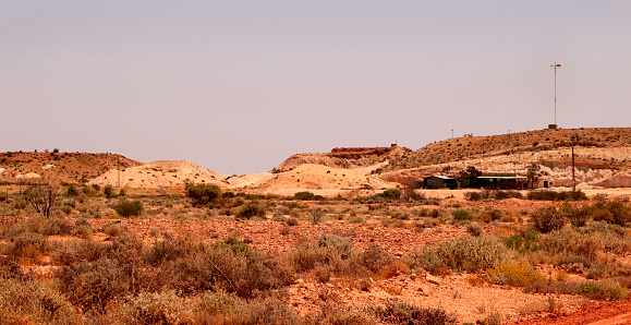 The desert landscape surrounding the opal mining town of Coober Pedy in the arid climate of outback Australia