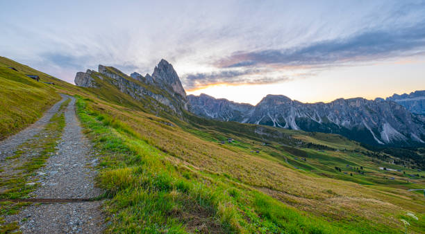 istock Dolomites' Seceda at sunrise, A golden spectacle graces the rugged landscape, casting warmth on iconic peaks 1856417077