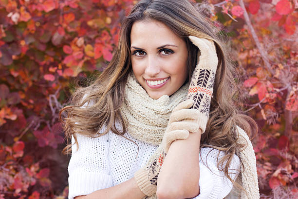istock Happy young woman in autumn forest 185643990