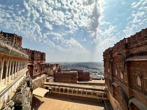 Jodhpur, Rajasthan, India - April, 11 2023: Stock photo showing view of the exterior walls of Jodhpur's Mehrangarh Fort an UNESCO World Heritage Site and the surrounding landscape.