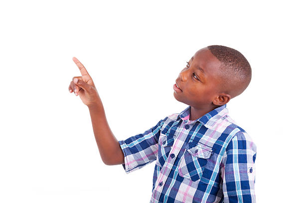 istock African American school boy looking up - Black people 185647736