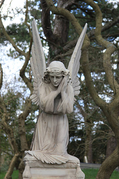 istock Guardian Angel grave monument 185648360