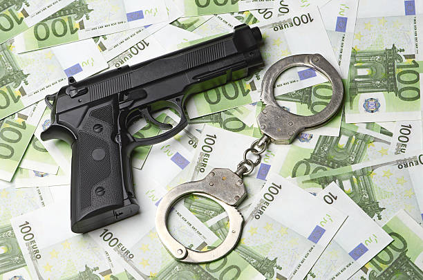 istock Image of the old gun and money 185648830