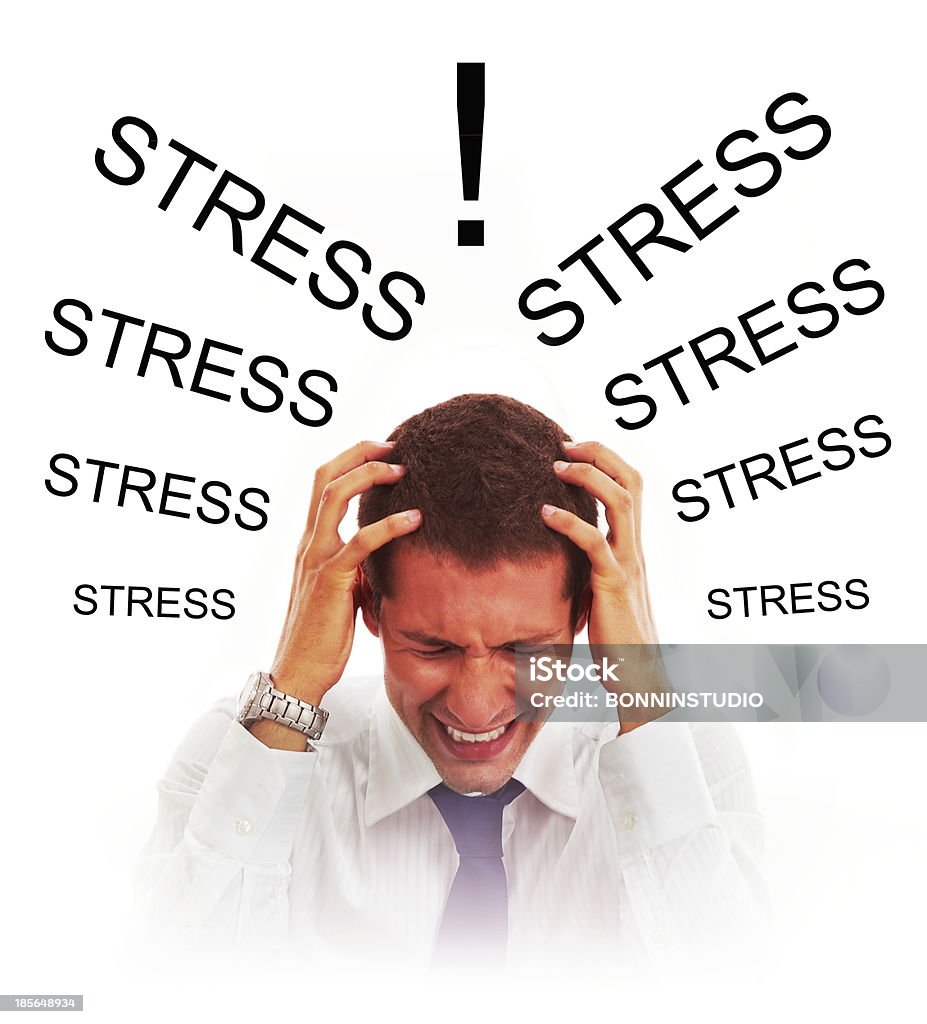 Stressed businessman with headache Young businessman working. Adult Stock Photo