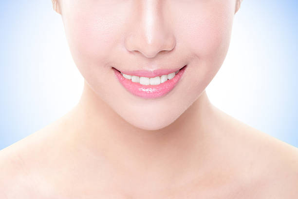 istock Beautiful young woman teeth close up 185649314