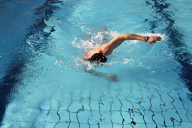 istock hobby swimmer swim the crawl in pool 185650867