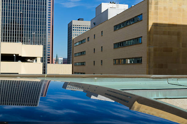istock Reflection of Buildings on a Car Roof 185651249