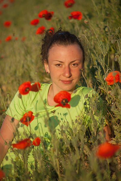 istock Young beautiful woman on cereal field in summer 185652024