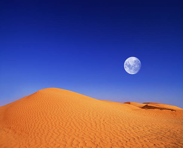 istock moon at night in africa just a minute away 185656291