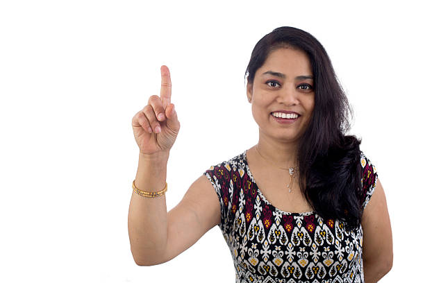 istock Indian Woman pointing finger up 185656427