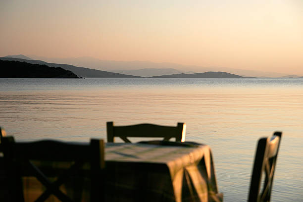 istock Cafe table near the sea, focus on horizon 185657285