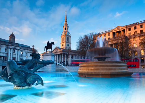 London, fountain on the Trafalgar Square with St. Martin on Fields behind