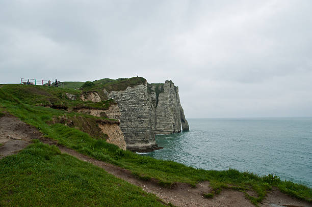 istock white cliffs and natural arches at Etretat in French Normandy 185659798