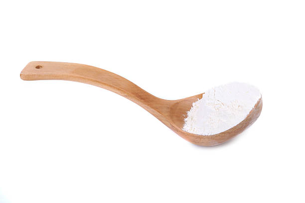 istock Wooden spoon with flour. 185661001