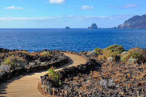 El Hierro, for lovers of peace and relaxation. A well-developed network of paths invites you to take leisurely walks with views of the vastness of the Atlantic. (Wooden plank path from La Maceta to Las Puntas)