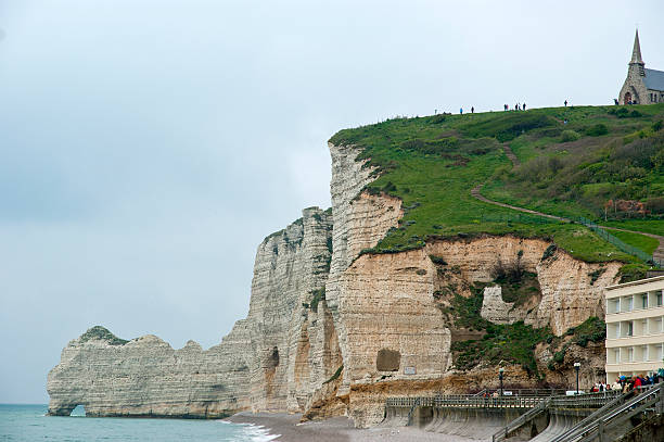 white cliffs and natural arches at Etretat in French Normandy