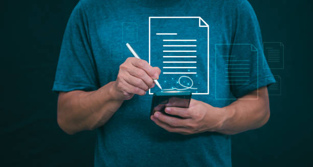 istock The person signing an electronic document on a smartphone, management concept, digital transformation Internet of Things, Big Data and Business Processes, Automated Operations, Data Storage 1856672402