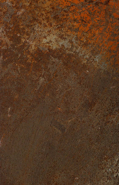 istock rusty plate of metal with some leftover orange paint 185676113