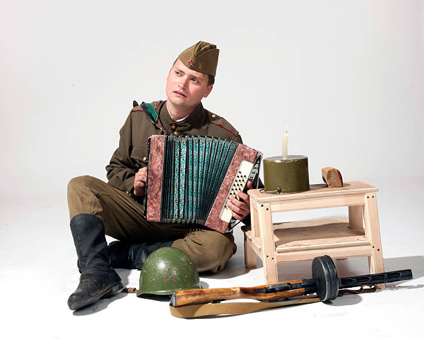 istock soldier with the accordion 185679520