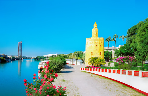 Spain - Seville Cityscape with Golden Tower (Torre del Oro) at Guadalquivir Riverfront  in Sevilla, Andalusia