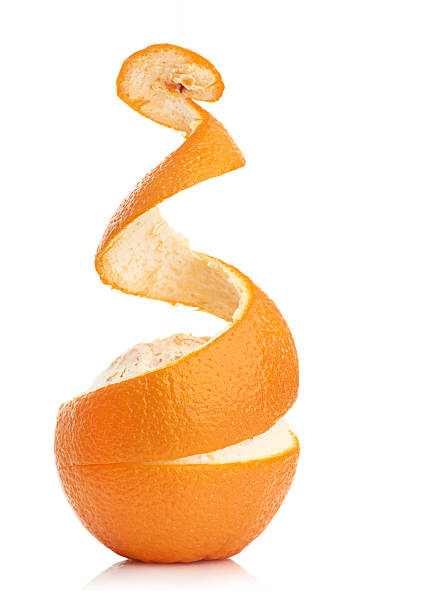 istock orange with peeled spiral skin 185684211