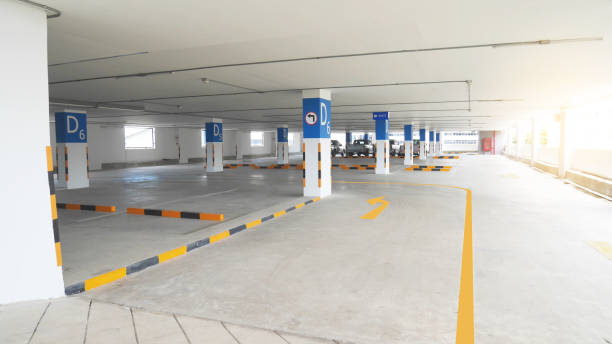 istock parking building. empty parking lot space concrete building 1856853622