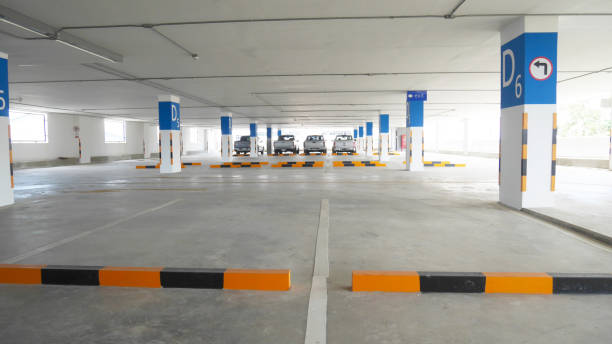 istock parking building. empty parking lot space concrete building 1856854127
