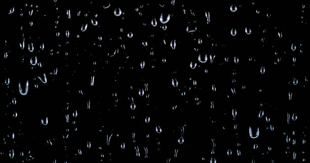 istock Close-up of raindrops on glass 1856868309