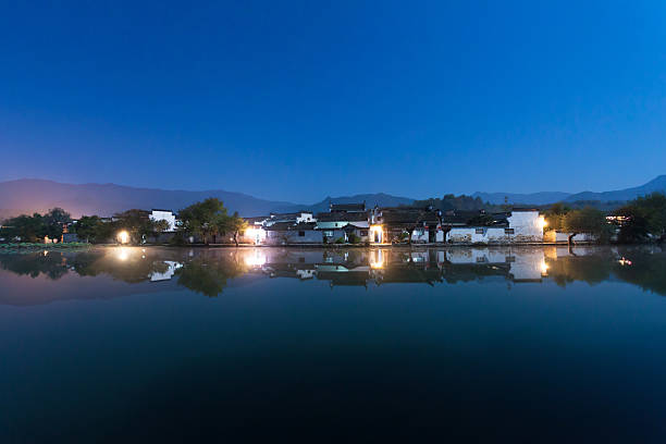 istock night scence of quiet lake 185691127