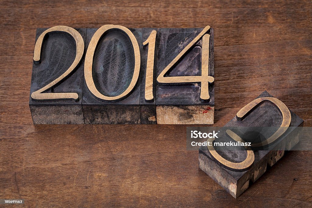new year 2014 new year 2014 replacing old year 2013 - letterpress wood type on a grunge wooden surface 2013 Stock Photo