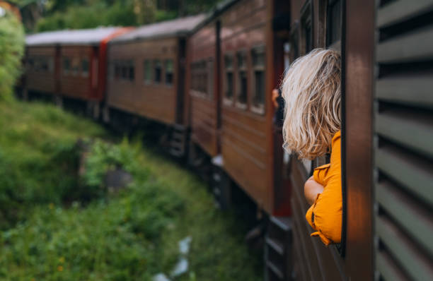 istock A woman enjoys a train ride in Sri Lanka 1856934302
