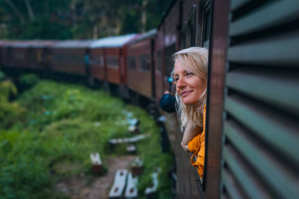 istock A woman enjoys a train ride in Sri Lanka 1856934307