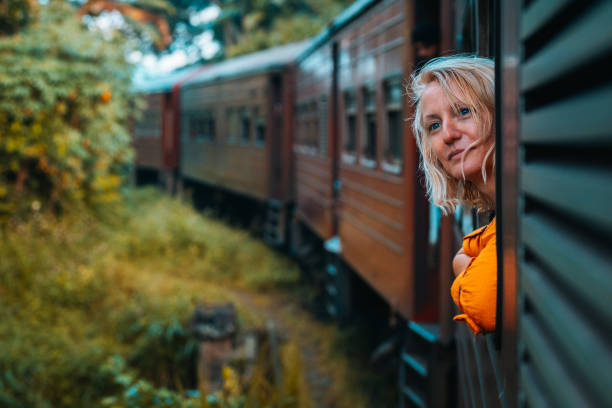 istock A woman enjoys a train ride in Sri Lanka 1856934826