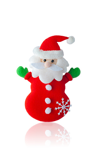 Little toy Santa Claus isolated on white background