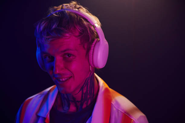 istock DJ in Headphones Mixing Music 1856981602