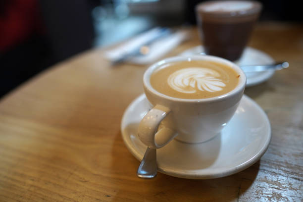 istock Flower latte art on latte coffee in the white cup 1857042412